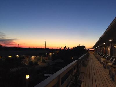 A beautiful sunset from the deck of our oceanfront hotel in the Hamptons. 