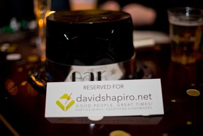A new years eve top hat in front of the davidshapiro.net logo. 