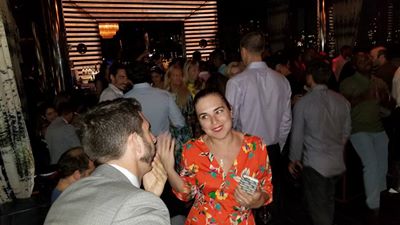 Young NYC professionals having fun at the best rooftop party in downtown Manhattan