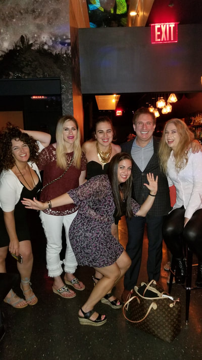 A group of friends at one of the hottest spots in NYC for single professionals 