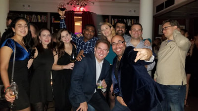 A big group at a trendy party in NYC