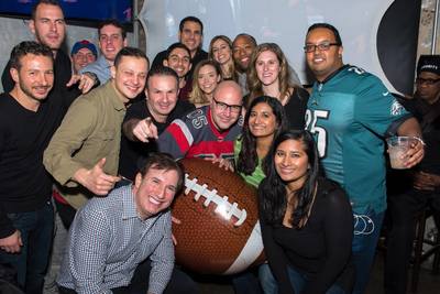 A big group at one of the most popular super bowl parties in NYC