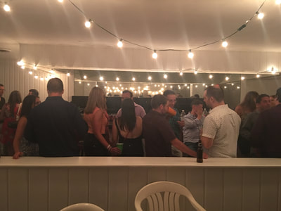 cocktail hour and dinner at our summer share in montauk for singles from nyc