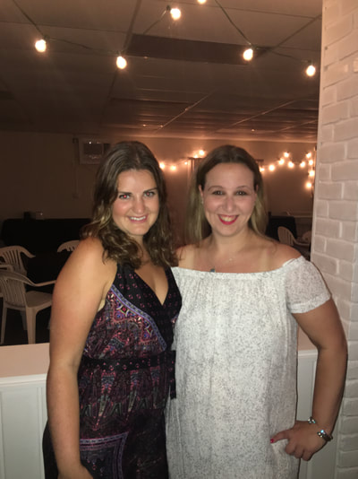 two girls enjoy a singles weekend trip for young professionals from manhattan in montauk