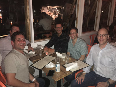 friends from nyc enjoy dinner at one of the best restaurants in montauk