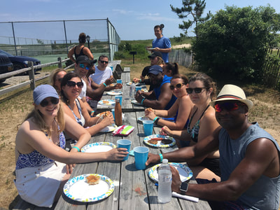 Singles from NYC mingling and enjoying a barbecue at our summer share in Montauk